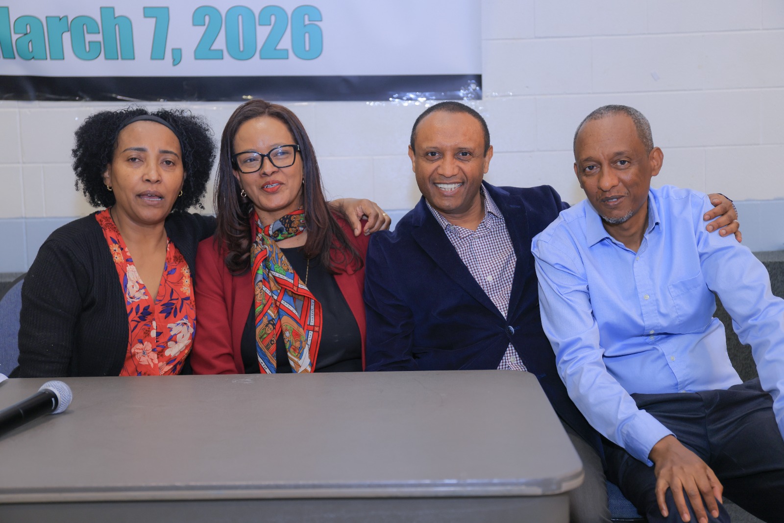 Committee and members share the moment