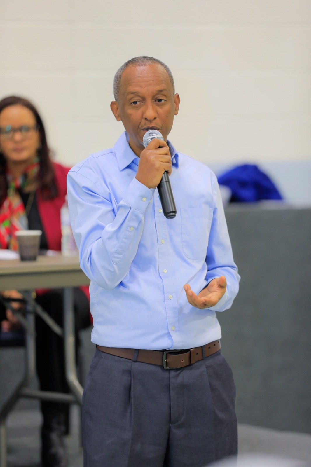 A member shares thoughts with the room