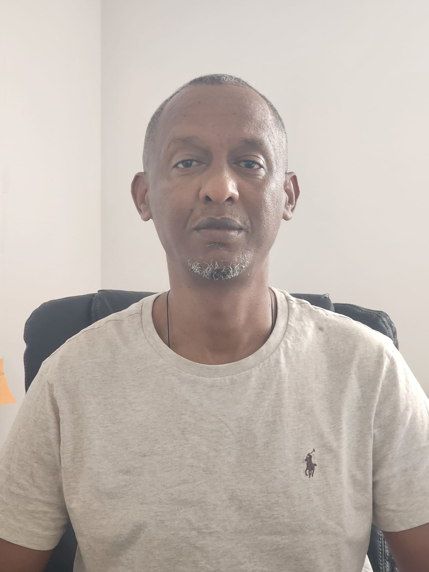Portrait of Belay Wolde, Director